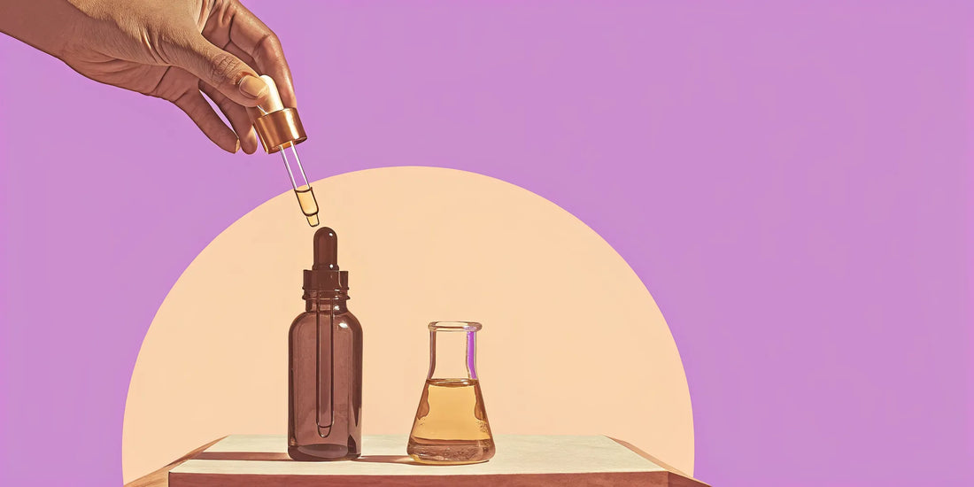 A hand preparing a dose of delta 9 tincture with a dropper.