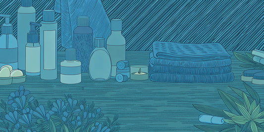 A collection of the best CBG oils for a wellness ritual, arranged with candles and spa towels.
